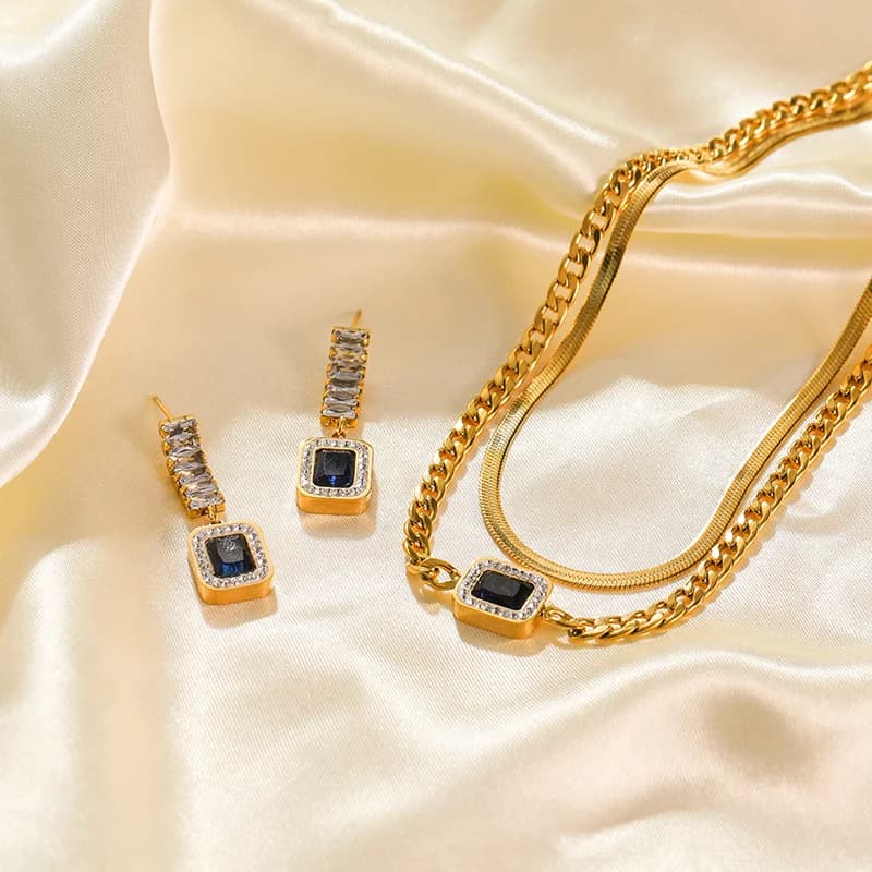 Set med blå zirkon ormkedja halsband och örhängen