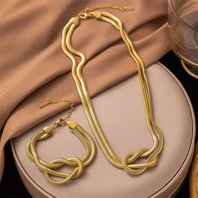Guldfärgad knutkedja halsband och armband set