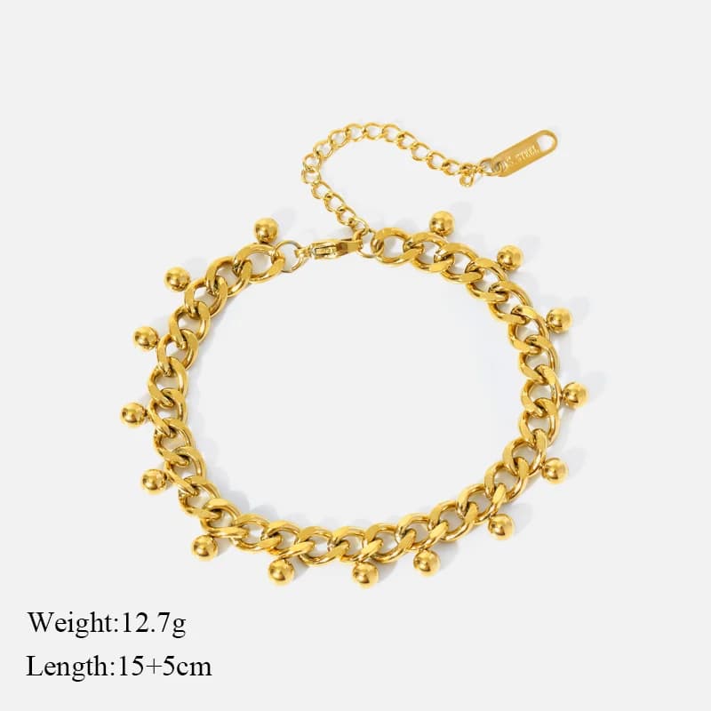 Halsband och armband i grov kedja, guld